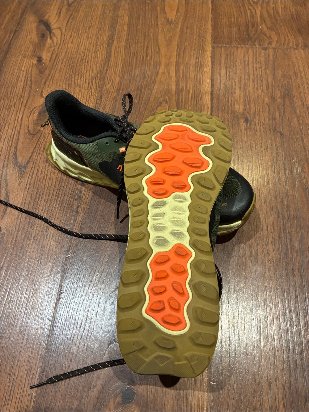 New Balance Olive Green and Black Trail Sneakers with Orange Accents - Picture 8 of 9